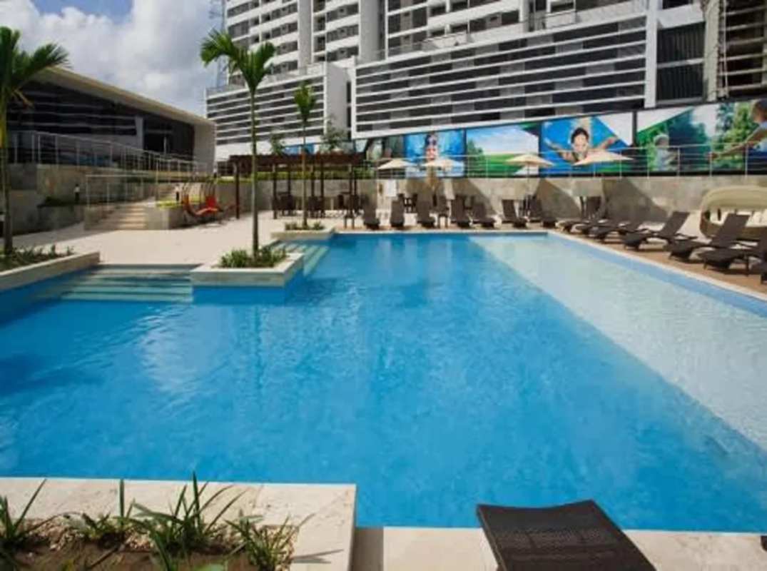 Aerial view of Panama City skyline and coastline from Costa del Este at sunset