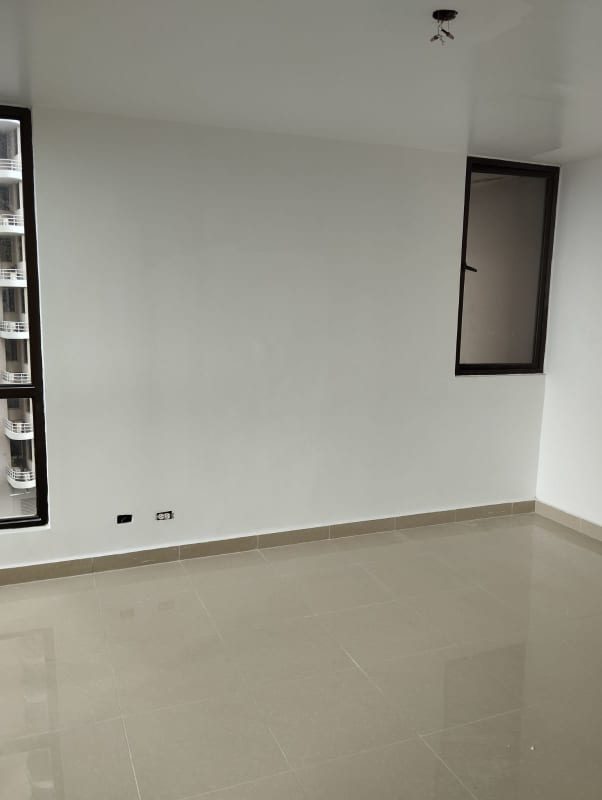 Empty bedroom with panoramic window and tiled floor in PH San Francisco Bay