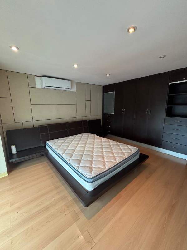 Minimalist bedroom design wood floors built-in closet air conditioner PH Terramar Altos del Golf