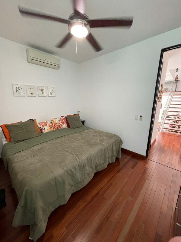 Contemporary bedroom design with built-ins and natural lighting in PH Bianco Loft Altos del Golf Panama