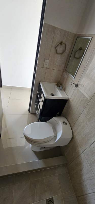 Small bathroom with vanity, tiles and mirror in PH Park City Bella Vista