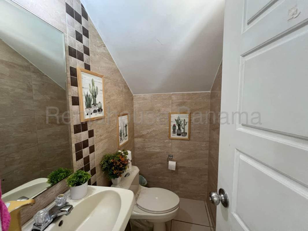 Bright living dining room with tile floors terrace access Augusta Brisas del Golf house Panama