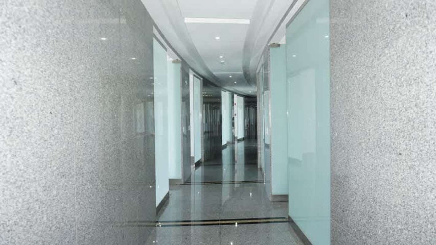 Golden Point Tower entrance lobby with glass doors and signage on Via Ricardo J. Alfaro El Dorado Panama