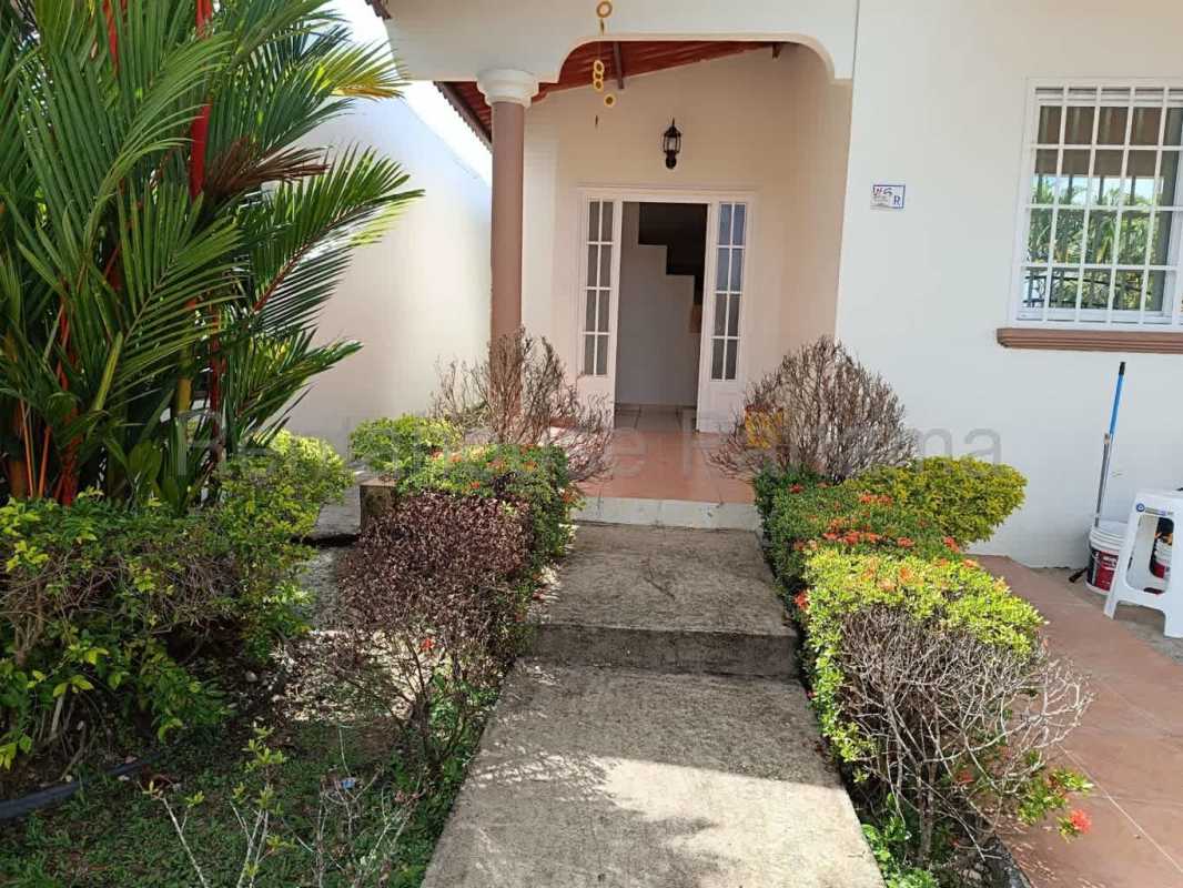 Spacious tiled living dining room with large window and ceiling fan in Brisas del Golf house Panama