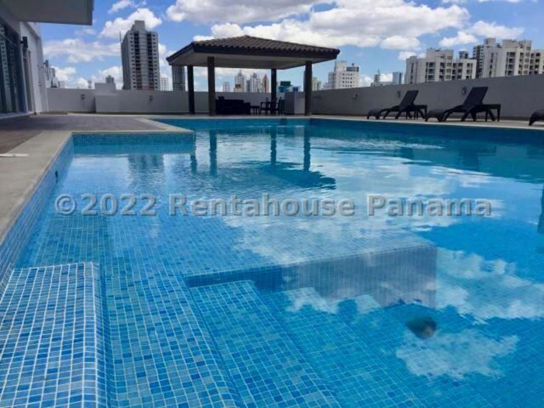 Rooftop swimming pool with gazebo seating and city skyline PH Park View Panama