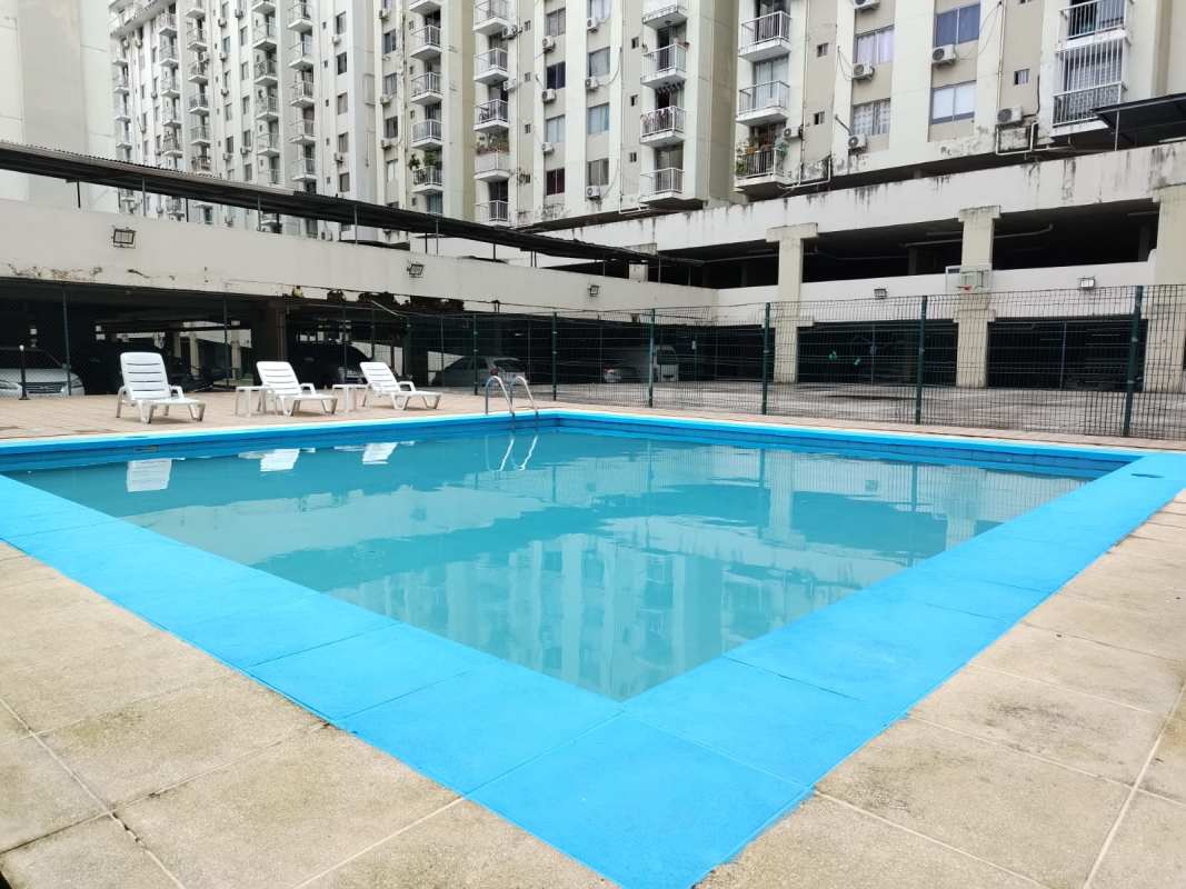 Playground with seesaws adjacent to apartment parking at PH Mystic Tower Panama City