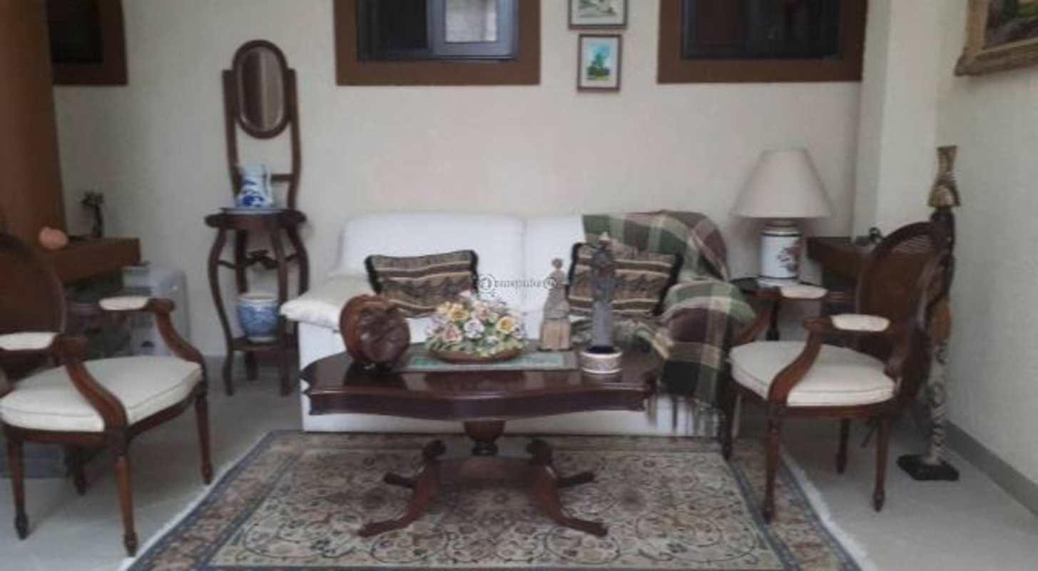 Traditional dining room with chandelier and classic decor Embassy Club Clayton Panama