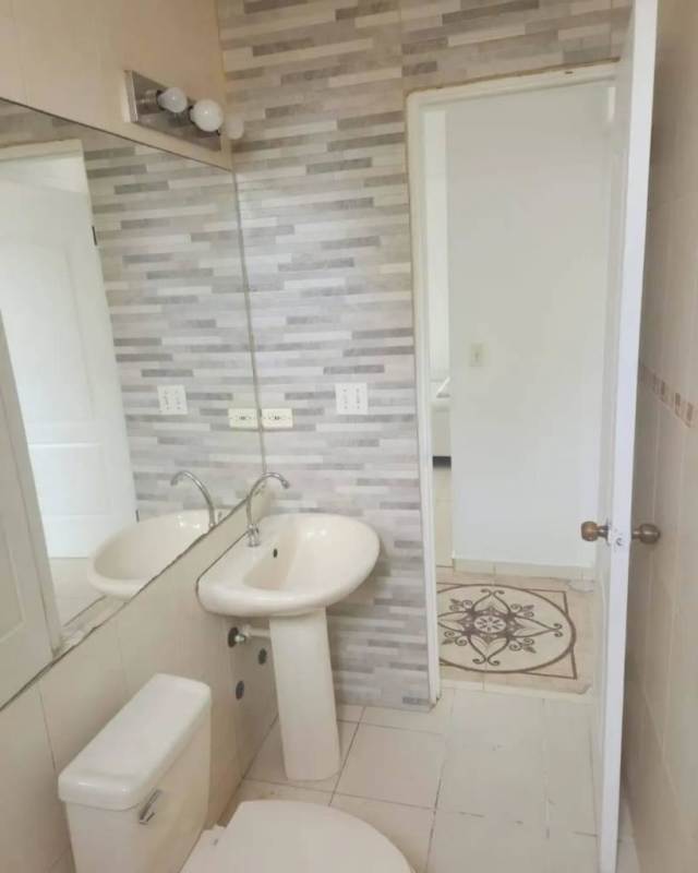 Contemporary apartment kitchen with granite counters appliances in PH Plaza 77 El Cangrejo Panama City