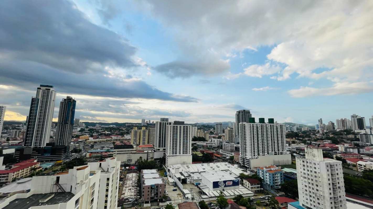 Modern galley kitchen with granite countertops in PH Carrasquilla Garden Carrasquilla Panama apartment for rent