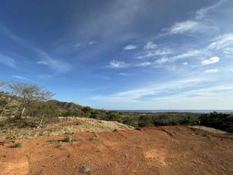 Open plot of countryside land with ocean and hillside views near Playa Venao Panama