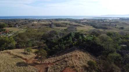 Aerial of hillside ocean view property near Playa Venao in Panama with coastal scenery