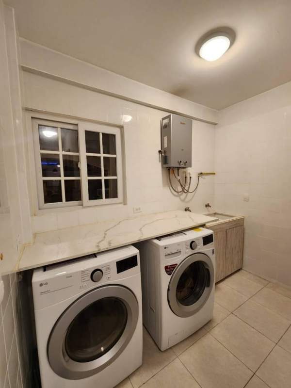 Contemporary kitchen with appliances granite countertops Villa Valencia Costa Sur Panama City