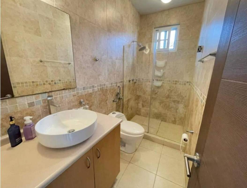 Spacious master bedroom with natural light, AC and closet in Villa Valencia Costa Sur Panama