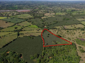 Aerial outline of farmland triangle plot surrounded by countryside in Los Santos Panama