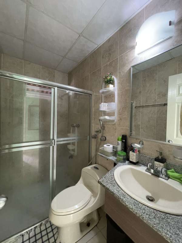 Laundry space with washer hammock storage at PH Colinas del Lago Las Cumbres Panama