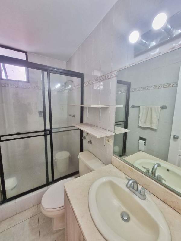 Outdoor swimming pool with lounge chairs at PH Plaza Real San Francisco Panama