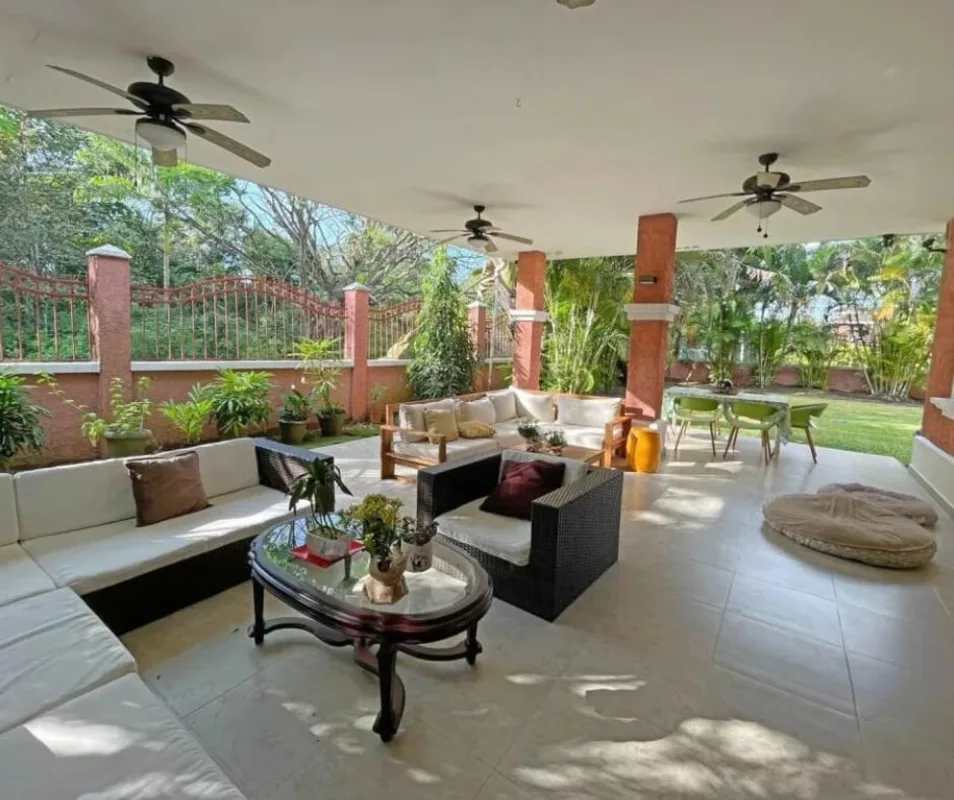 Spacious Mediterranean patio with ceiling fans and garden at house in Los Lagos Clayton Panama