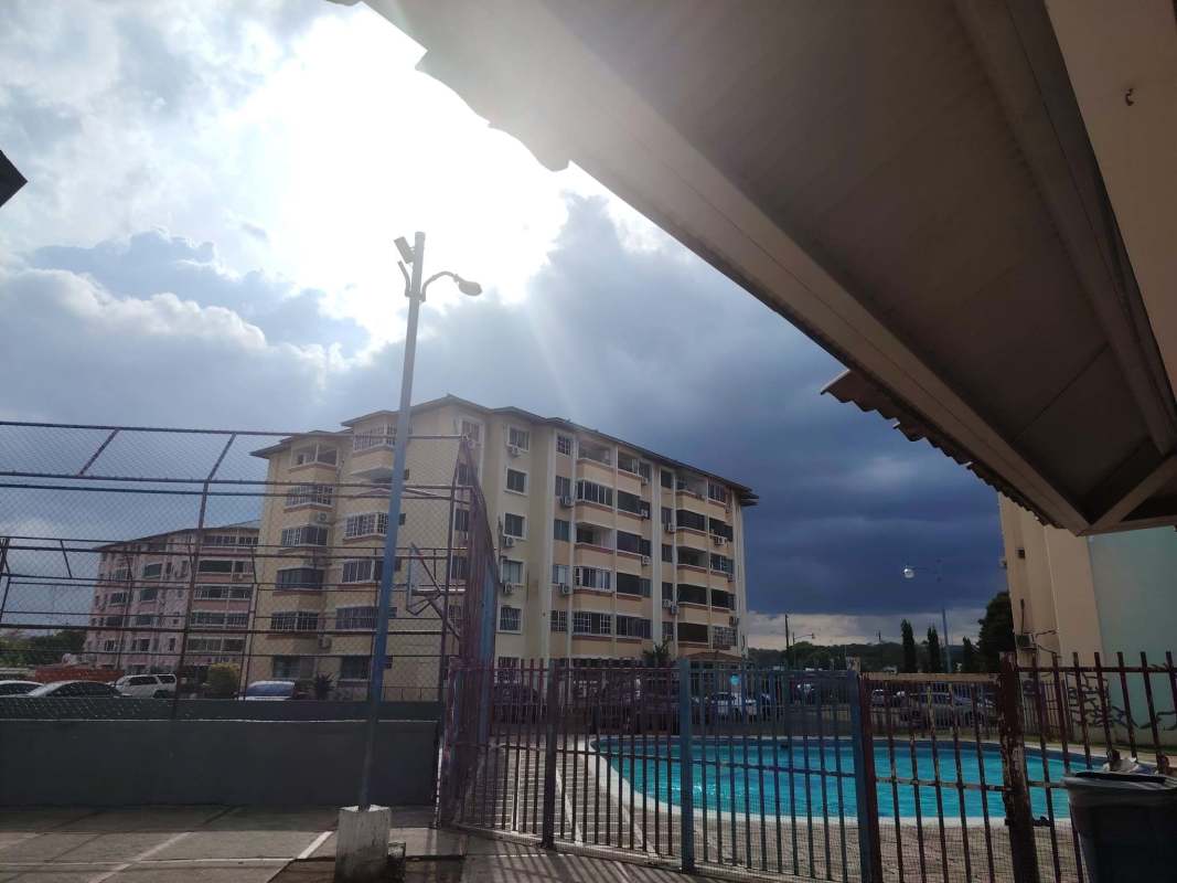 Apartment interior corridor with wood doors and security features PH Campo Limberg Panama City