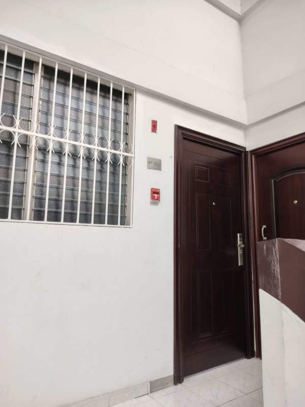 Remodeled minimalist kitchen with granite counters and double sink in PH Campo Limberg