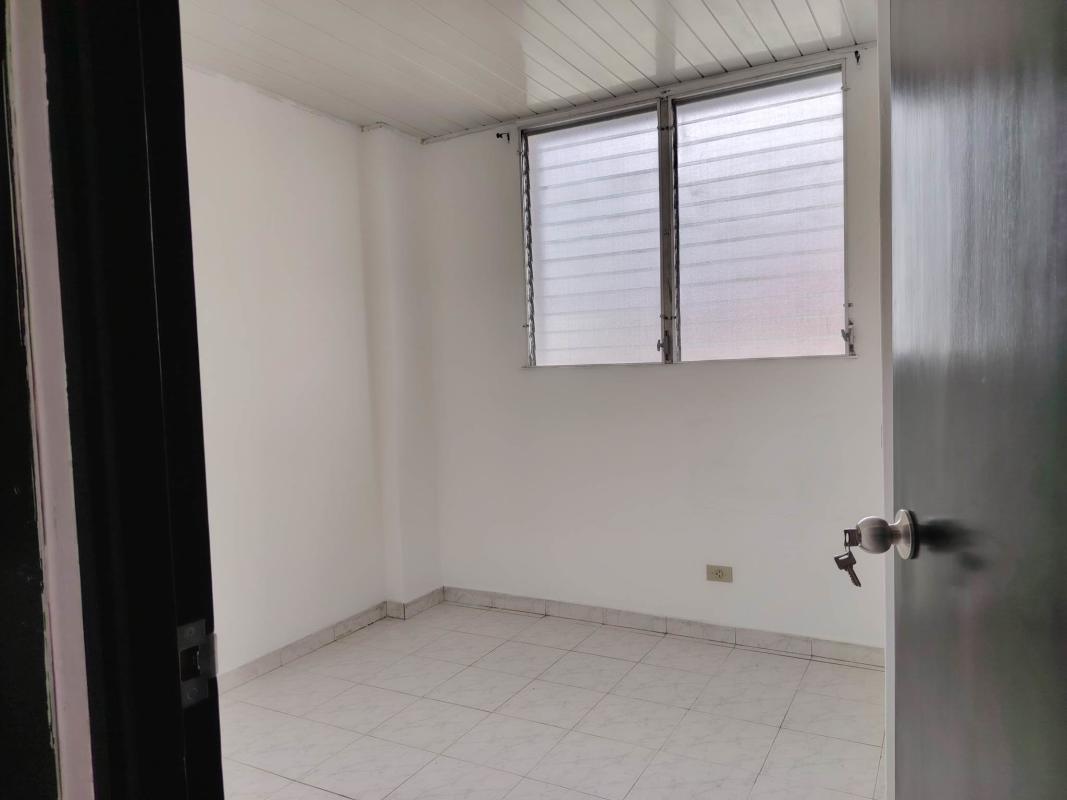 Apartment building complex with swimming pool and sports court at Campo Limberg Panama