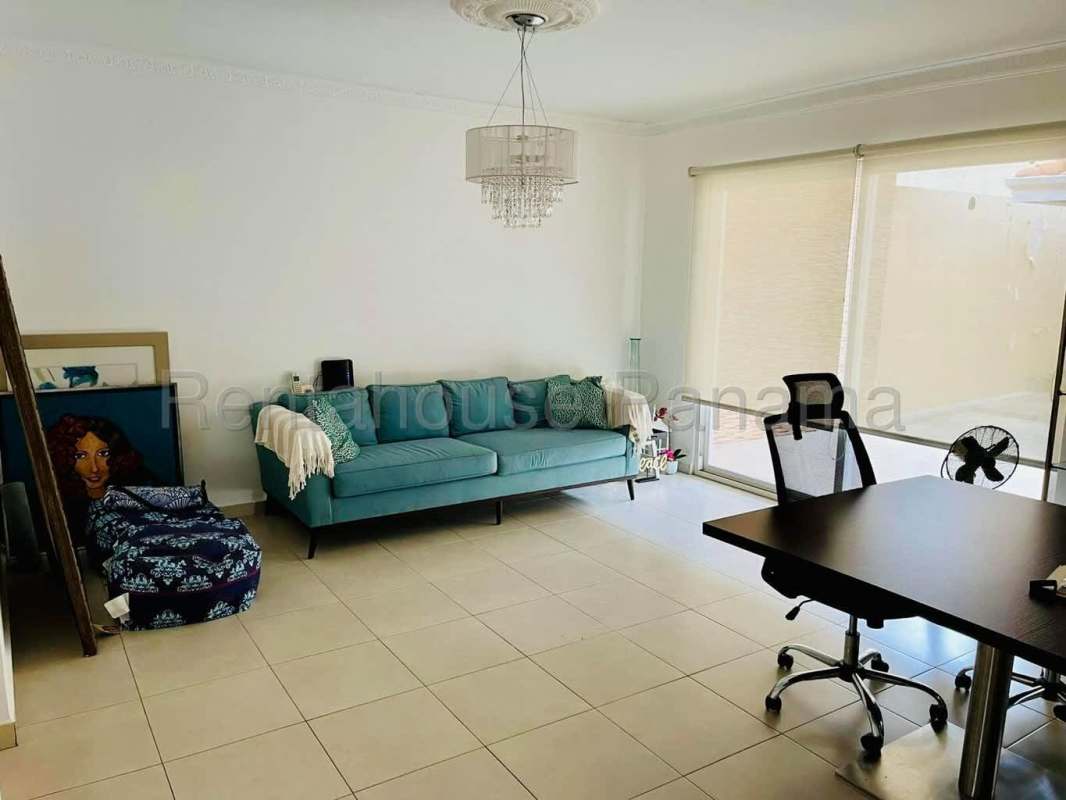 Spacious kitchen with granite countertops, dark wood cabinets and stainless appliances in Villa Tivoli Panama