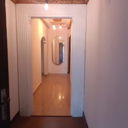 Street view of contemporary commercial building near Alto de San Judas Colón