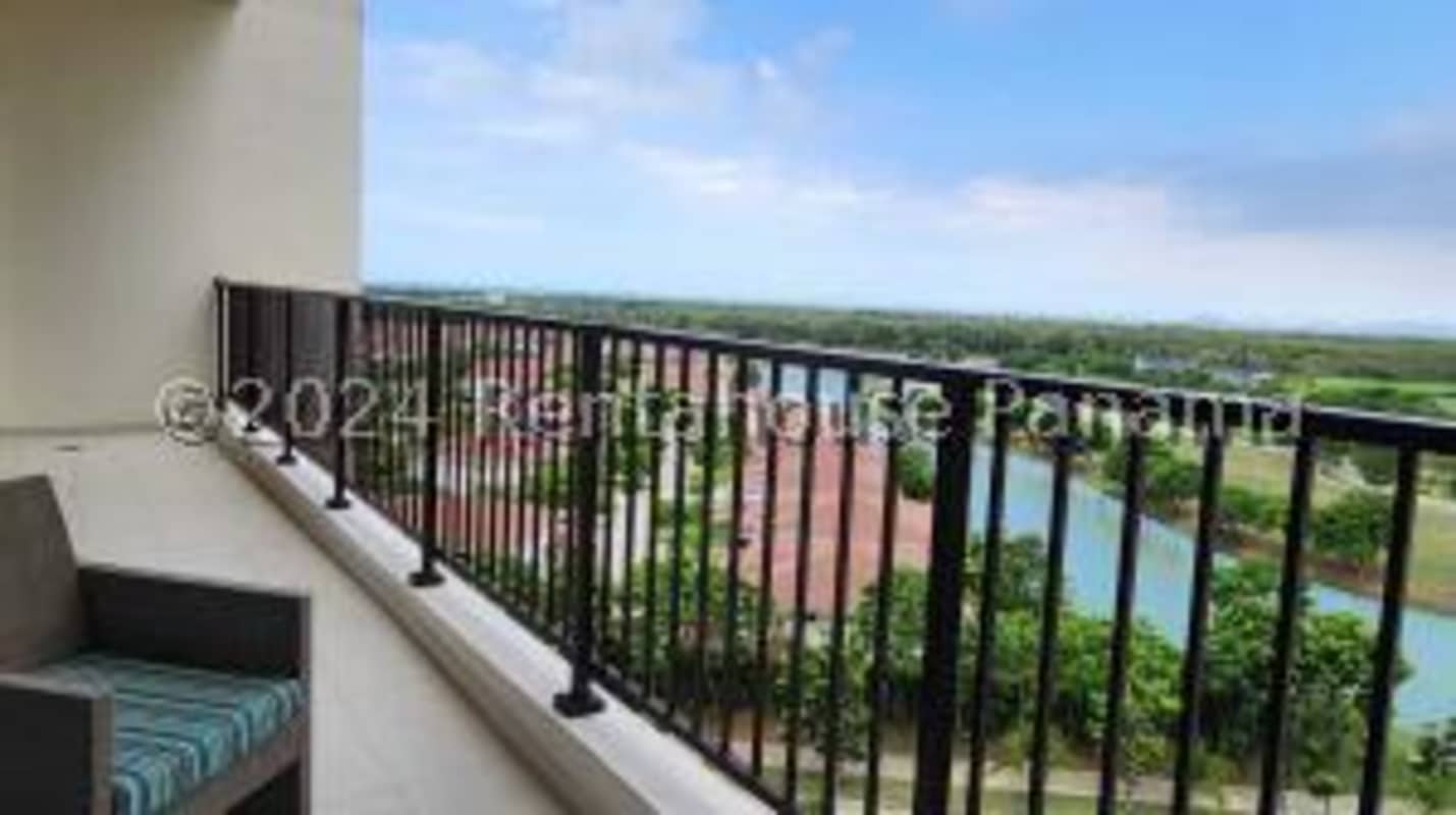 Gourmet kitchen with marble counters and central island in PH Santa Maria Court Panama