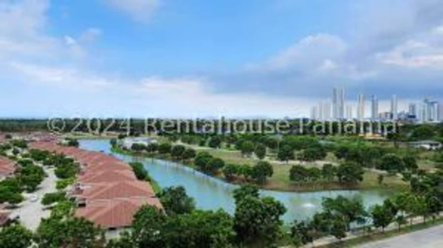 Private balcony with panoramic views of golf course and lake at PH Santa Maria Court Panama