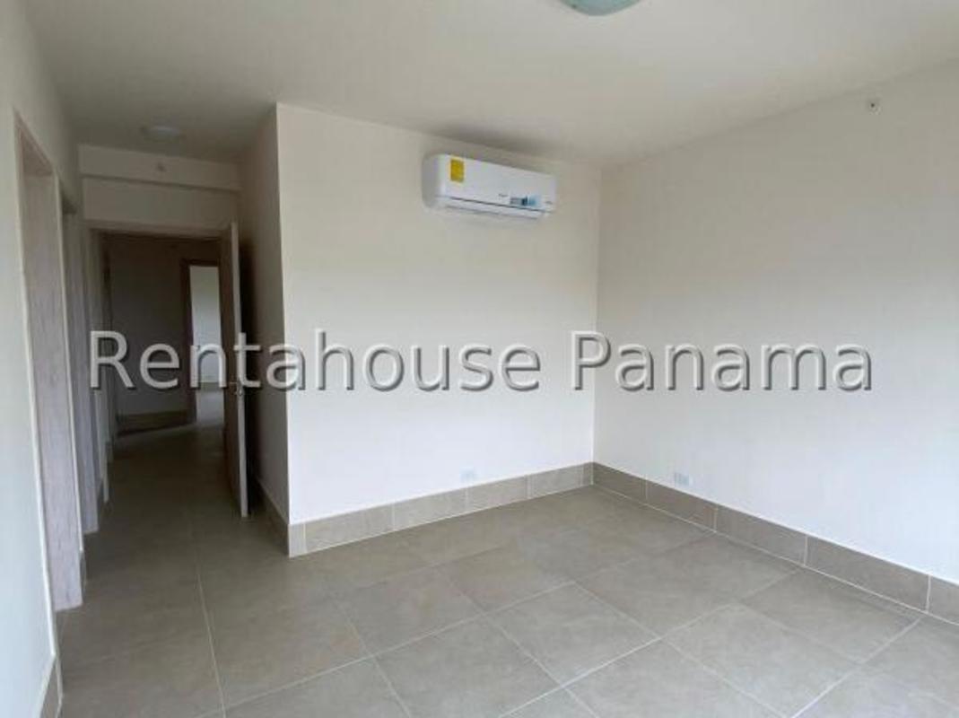 Bright bedroom with large windows and golf course view in Santa Maria Panama City