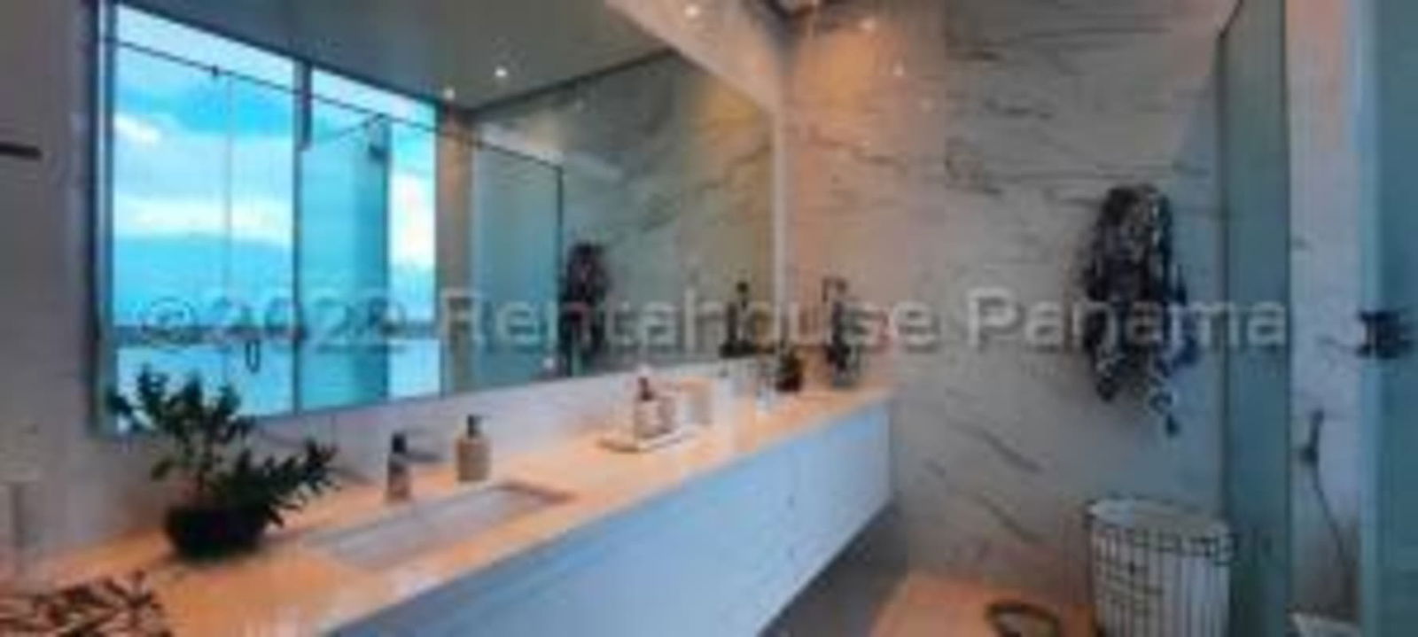 Contemporary open kitchen with island, granite countertops, and ocean view in PH Acqua