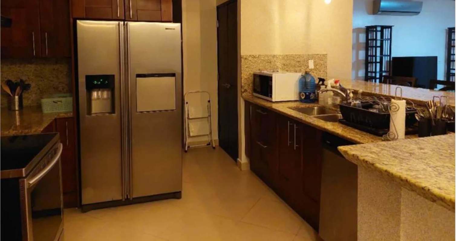 Modern kitchen granite countertops stainless steel appliances Embassy Club Clayton Panama