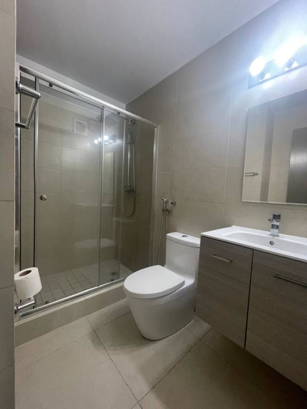 Bedroom with tiled floors and windows PH Lumiere Costa del Este Panama