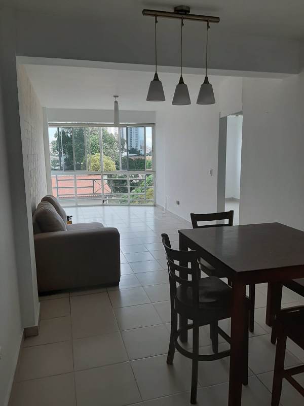 Modern bright apartment living dining room with windows, balcony access Vista del Golf Parque Lefevre Panama