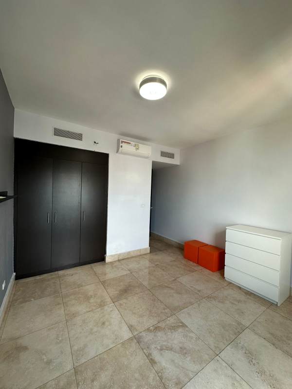 Minimalist bedroom with tile flooring, AC, closet in PH Coco del Mar