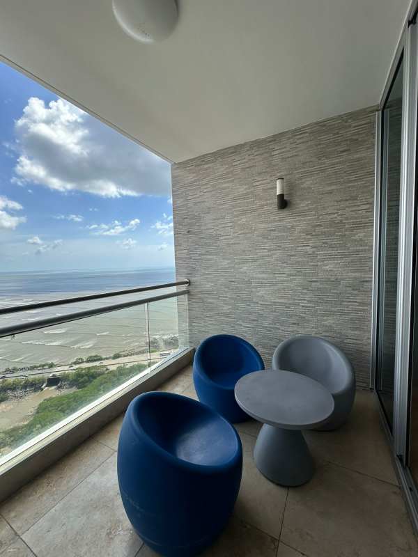 Balcony with glass railing, panoramic Pacific Ocean view in Panama City