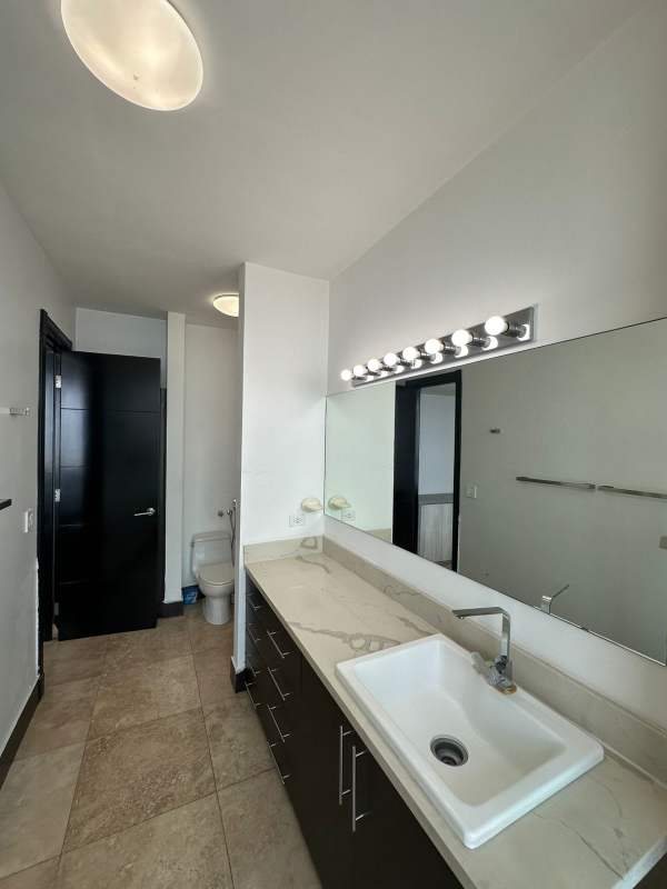 Contemporary bathroom with glass enclosed shower, vanity PH Coco del Mar