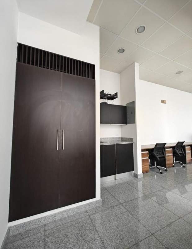 Workspace with built-in cabinetry, granite countertop PH Habitáts Plaza Obarrio