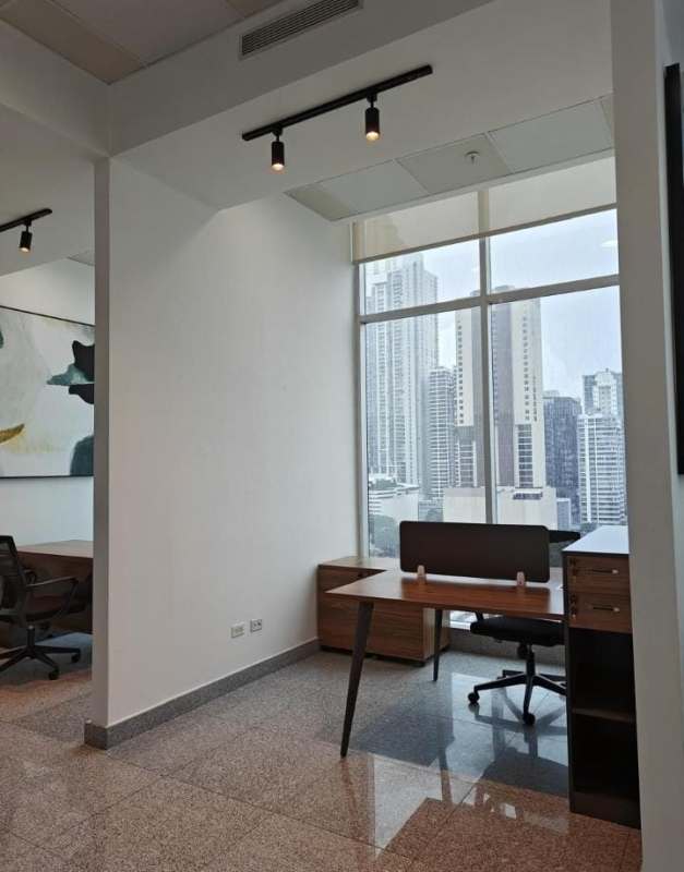 Granite kitchenette with cabinets and sink in PH Habitats Plaza Obarrio Panama City