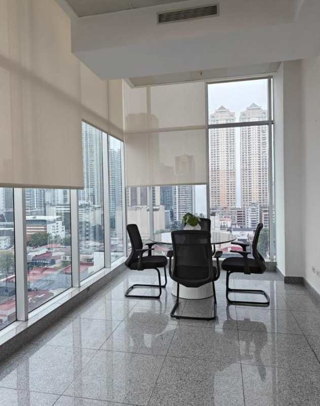 Glass-walled meeting room with panoramic view PH Habitats Plaza Panama City