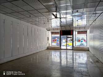 Interior retail store space with large front windows and display fixtures Bugaba Panama
