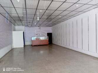 Open retail unit with display panels and drop ceiling in downtown Bugaba Panama