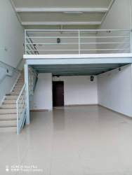 Interior view mezzanine level overlooking main retail area in Bugaba commercial strip Panama