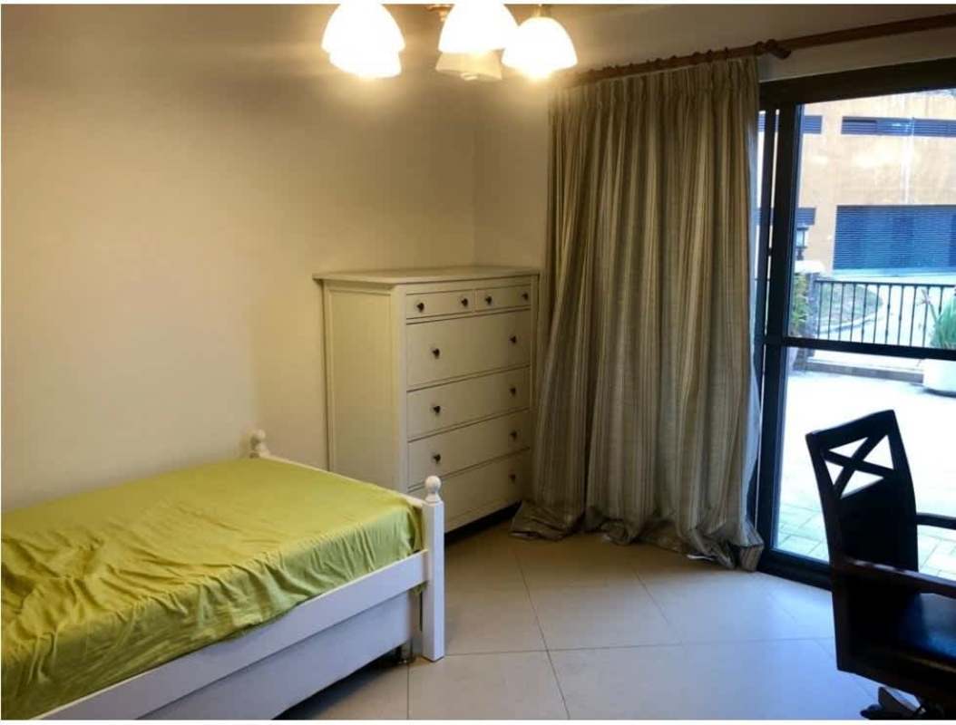 Laundry room with stacked washer dryer in PH Clayton Park Clayton Panama