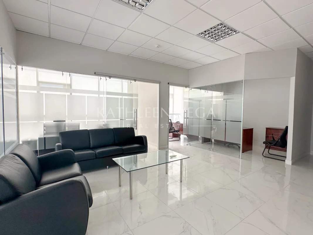 Office kitchenette with appliances microwave cabinets commercial workspace