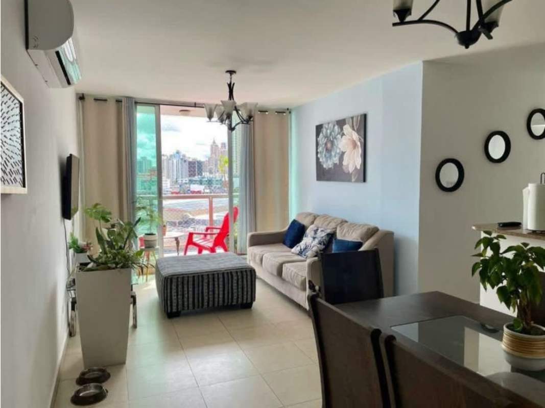 Built-in wooden wardrobe with shelving and hanging rods in PH Portofino Via Porras Panama