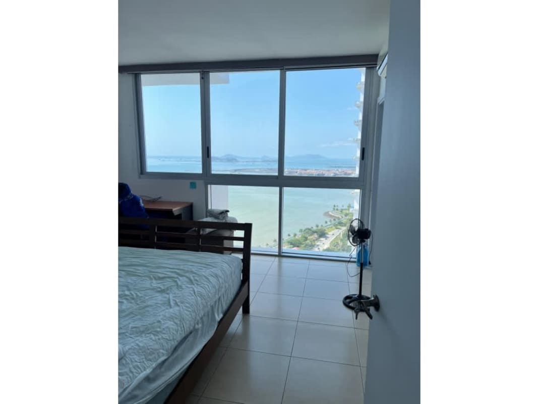 Infinity swimming pool with skyline and ocean view atop PH White Tower in Panama City