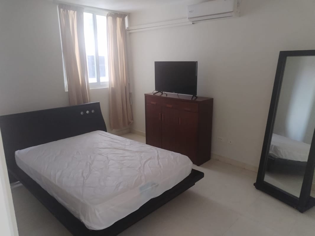 Bedroom with large window, AC, closet in PH Aurora Tower Panama City