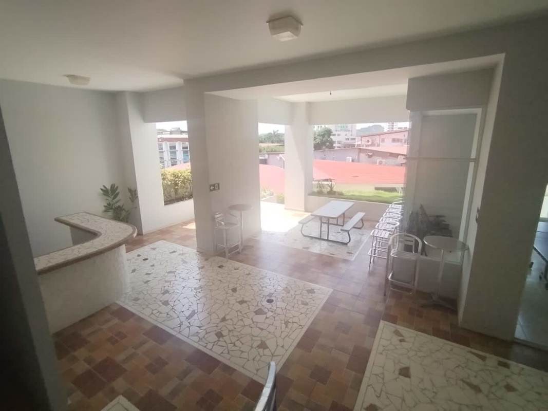 Indoor covered patio with bar counter and tables PH Aurora Tower Panama