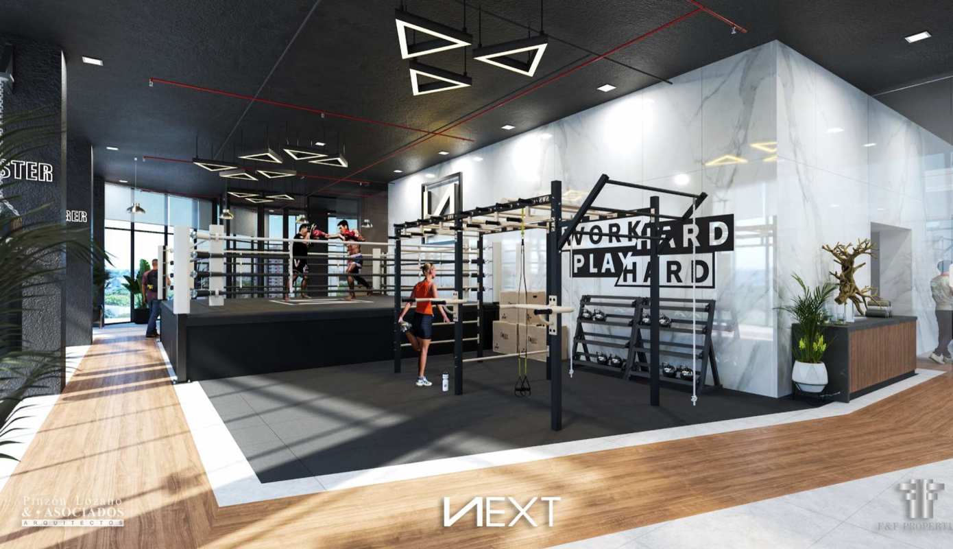 Modern gym with boxing ring training equipment glass walls PH NEXT Panama City