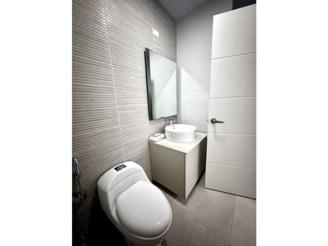 Luxury minimalist bathroom vessel sink glass door PH Golden Point Tower Panama